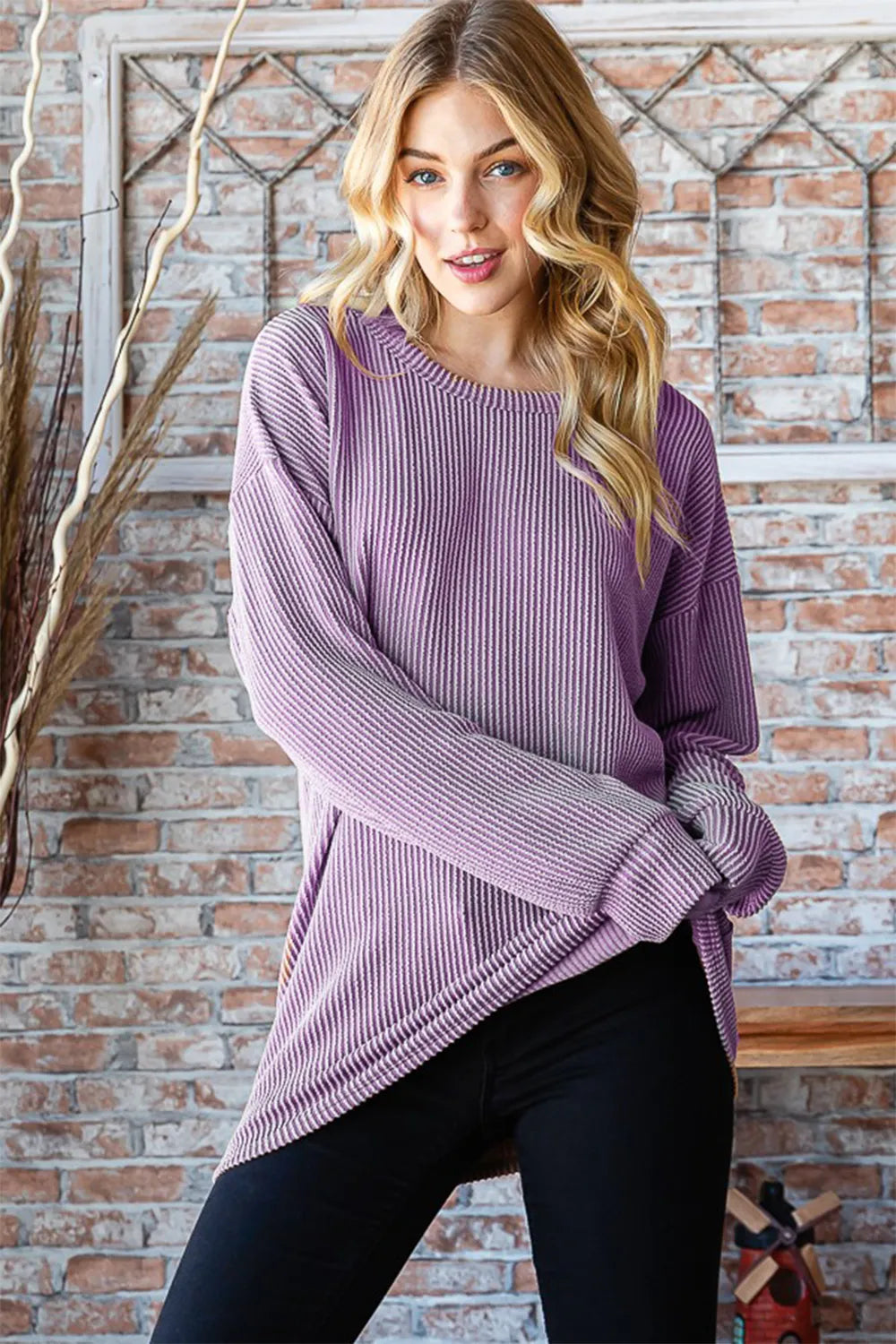Heimish full size round neck dropped shoulder blouse in soft fabric, displayed on a hanger with a neutral background.