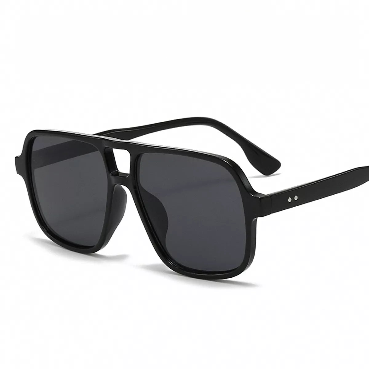 Oversized aviator sunglasses by Trendsi with gold-tone frames and dark tinted lenses, reflecting a stylish, bold accessory.