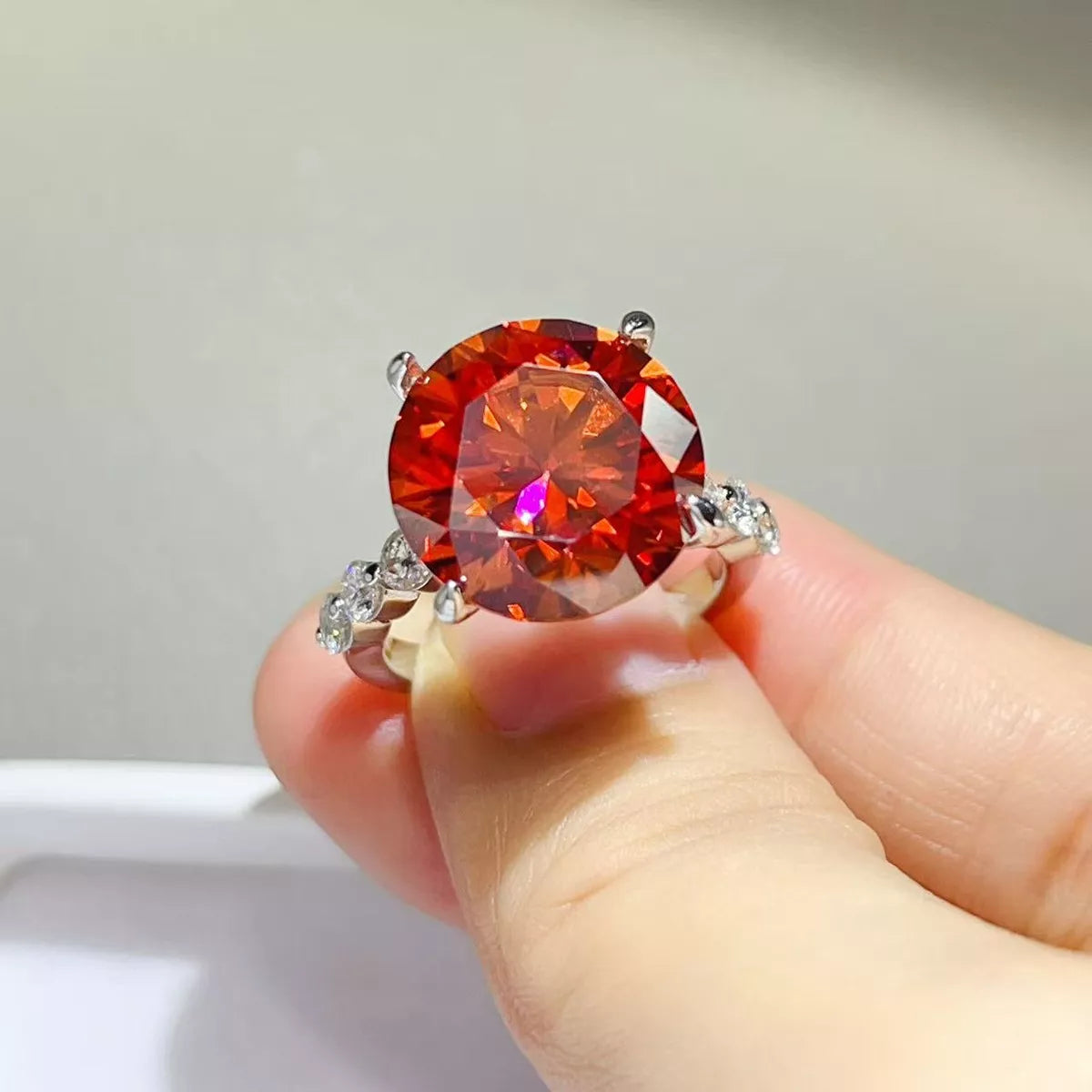Sterling silver ring with a 10-carat moissanite gemstone, showcasing a sparkling, elegant jewelry design.