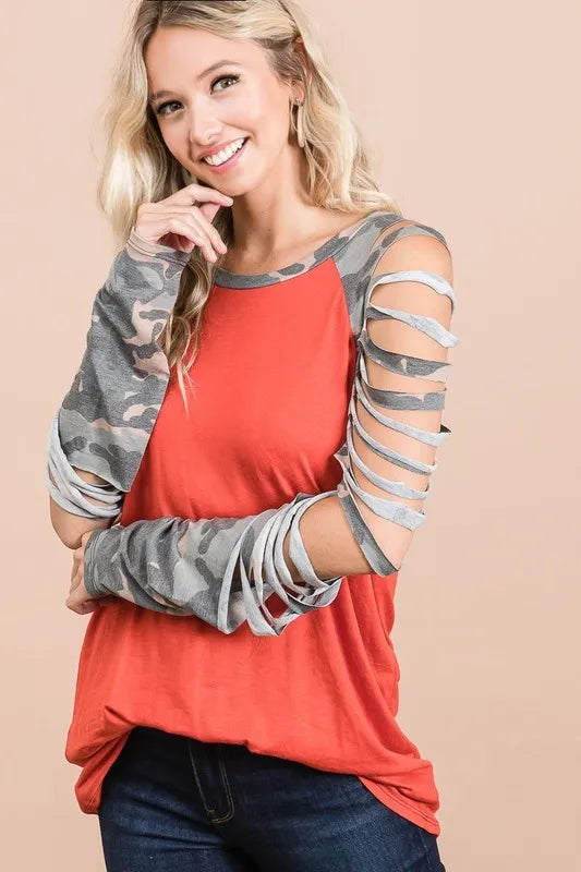BiBi Jersey Knit Top with camouflage laser cut sleeves by Trendsi, showing the stylish top with detailed sleeve design.