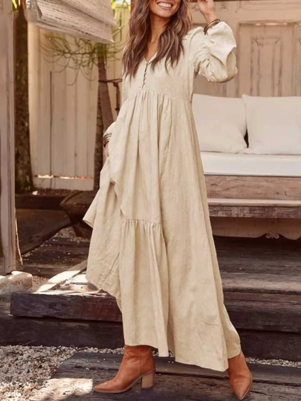Plus size Trendsi full size V-neck long sleeve tiered maxi dress with pockets, featuring a flowy silhouette and comfortable fit.