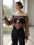 Floral embroidered mesh off-shoulder top by Trendsi, featuring delicate embroidery and sheer fabric, stylish and feminine design.