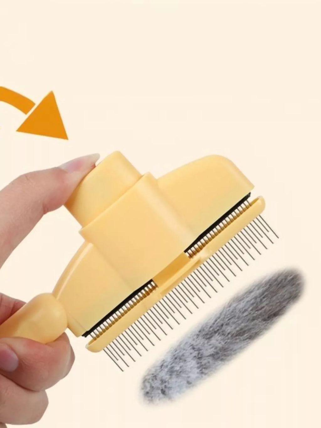 Self-cleaning Slicker pet hair remover brush from Trendsi, showing fine metal bristles and ergonomic handle for grooming pets.