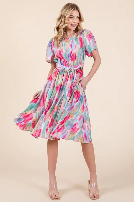 Lime 'N' Chili watercolor print tie-front midi dress by Trendsi, featuring a colorful pattern and flowy fabric.