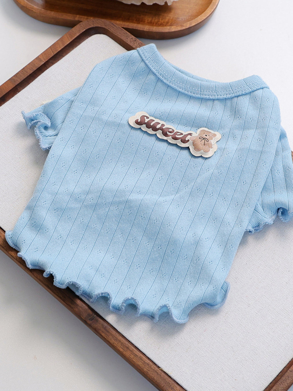 Sweet Bear Patch ribbed pet top from Trendsi, featuring a cute bear patch design on a cozy ribbed fabric for pets.