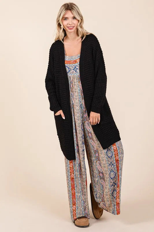 Trendsi Mittoshop open front long sleeve longline cardigan hanging on a hanger with a soft knit texture.