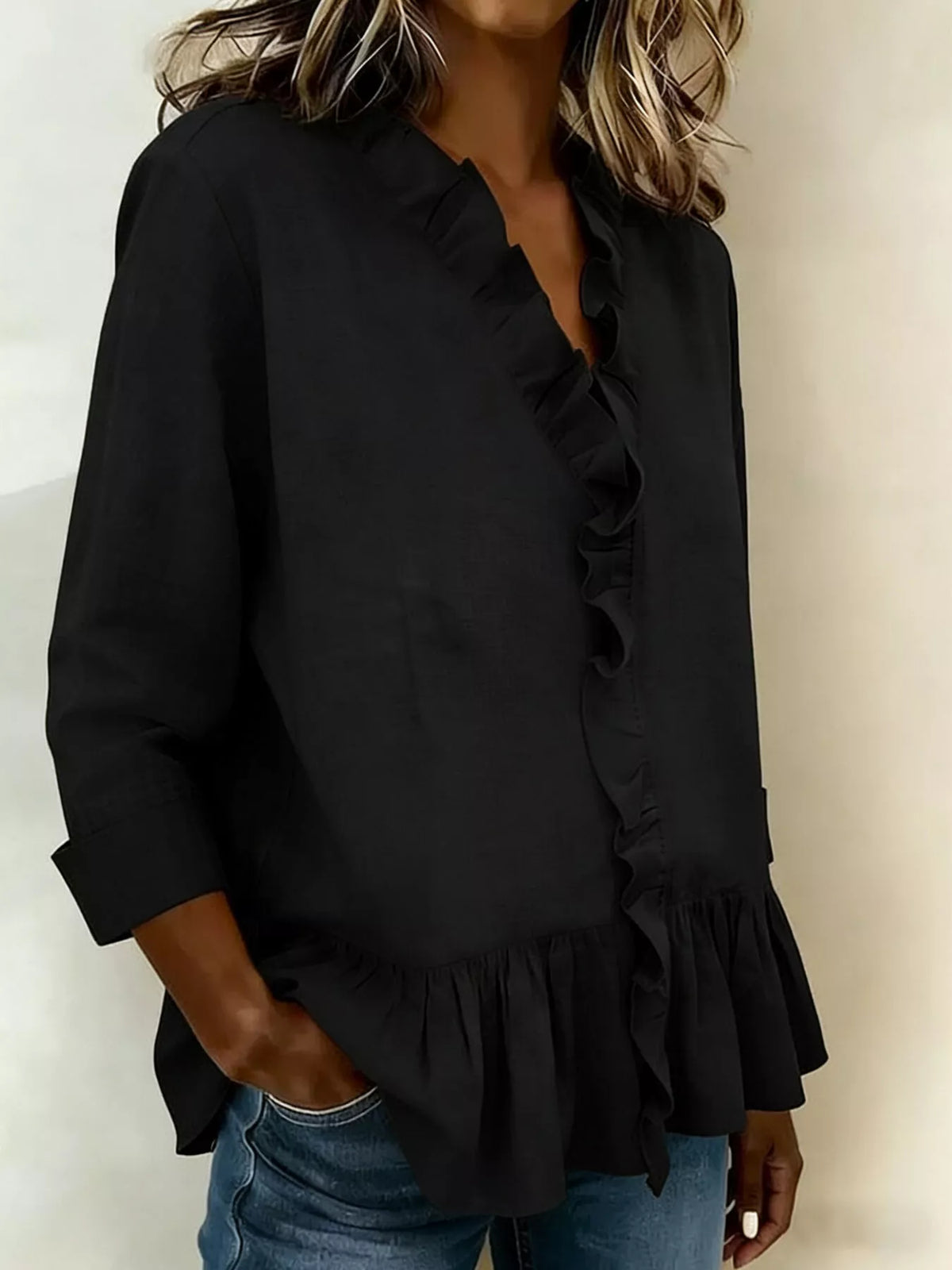 Plus size ruffled V-neck long sleeve blouse by Trendsi, featuring a flattering fit with ruffle details and a V-neck design.