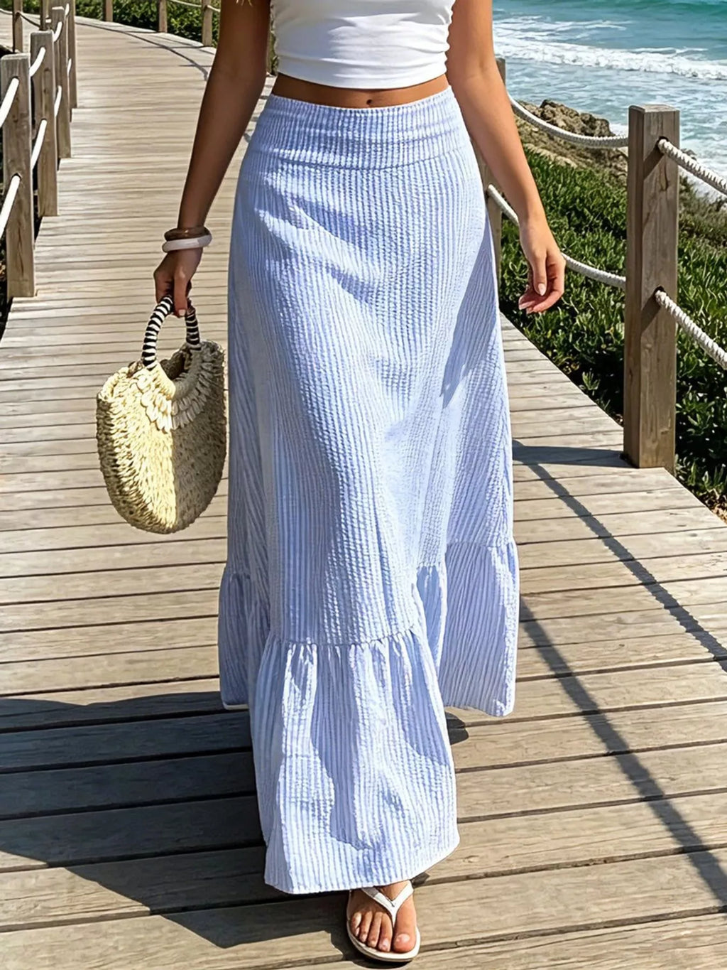 Gingham maxi skirt with ruffled hem from Trendsi, featuring a flowy design and classic checkered pattern in soft fabric.