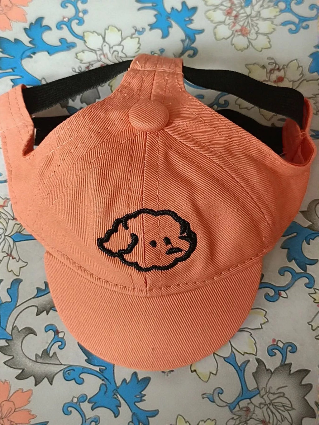 Embroidered pet baseball cap by Trendsi featuring colorful stitching, adjustable strap, and a classic curved brim for dogs or cats.