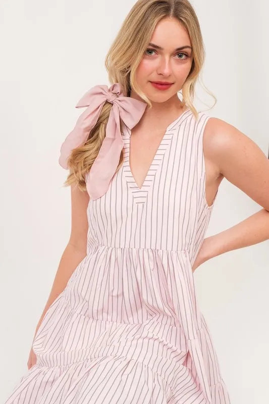 Lime 'N' Chili striped sleeveless V-neck tiered dress by Trendsi, featuring bold colors and a relaxed fit with tiered skirt design.