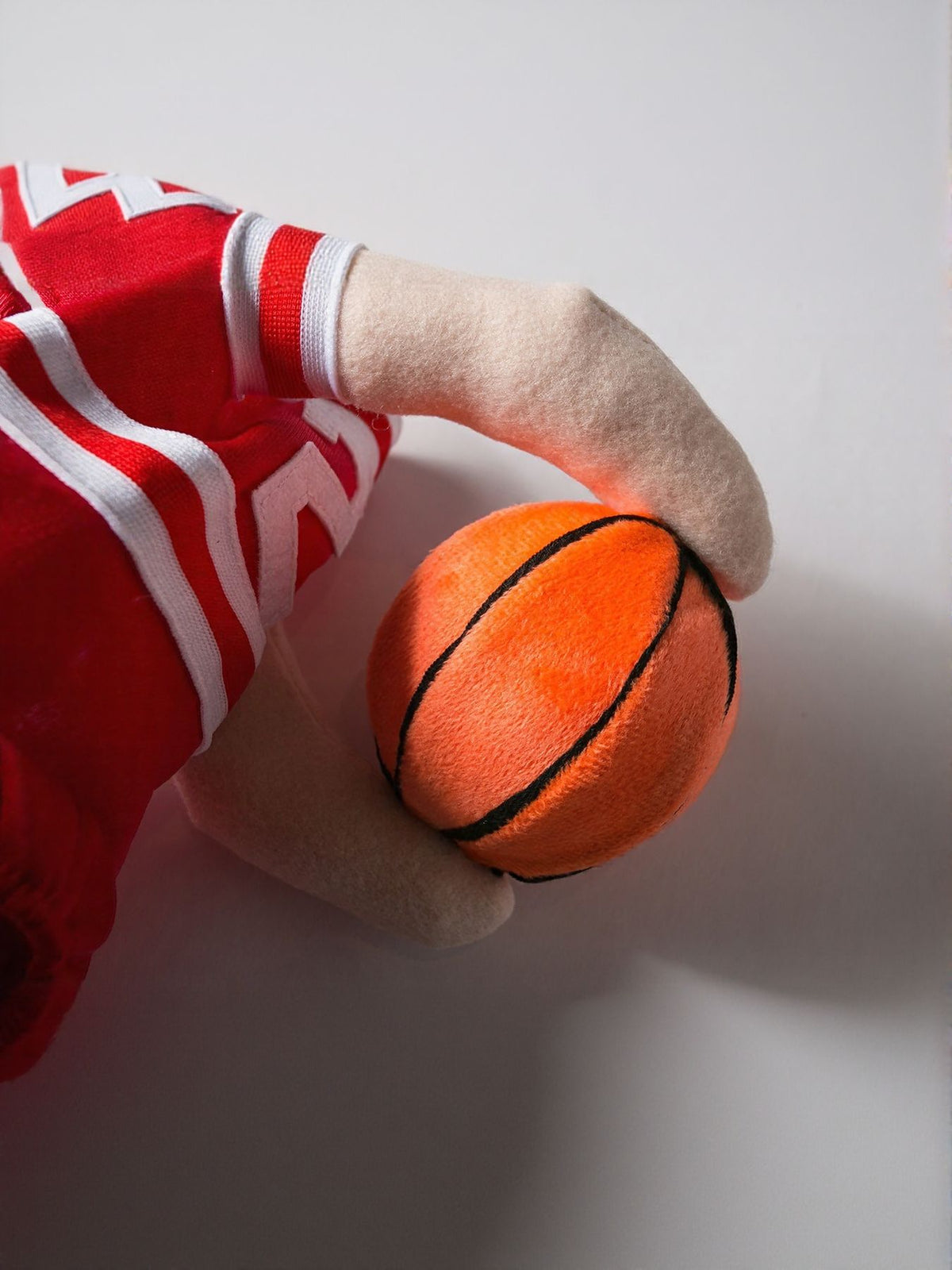 Sporty basketball-themed pet jumpsuit by Trendsi featuring a comfortable fit and playful design for dogs.