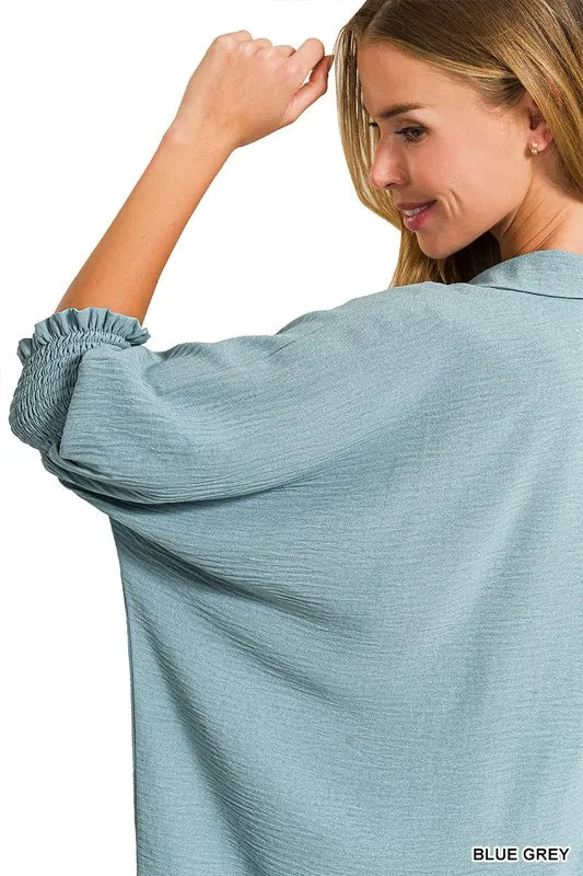 Zenana airflow collar tee with smocked sleeve band, featuring a relaxed fit and trendy design in soft fabric, perfect for casual wear.
