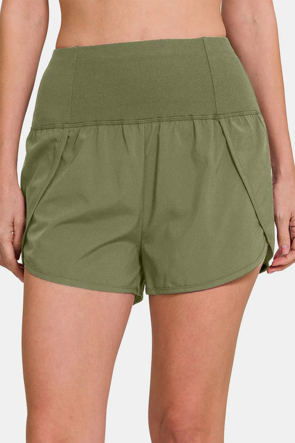 Zenana high-waisted active shorts with zippered back pockets, designed for comfort and style during workouts or casual wear.
