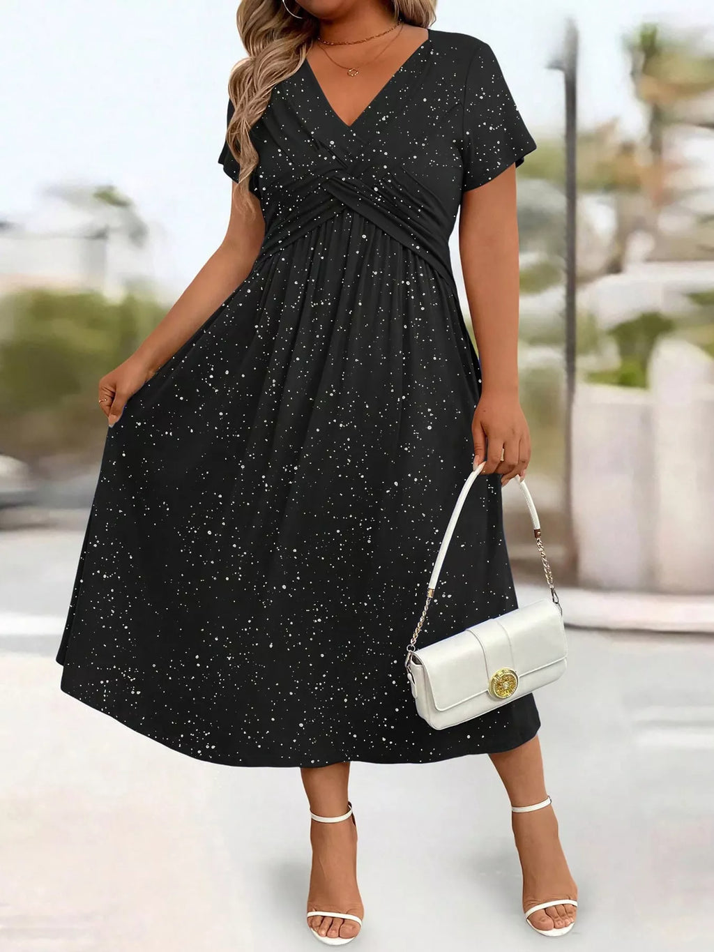 Plus size twisted front short sleeve midi dress with pockets by Trendsi, featuring a stylish full-size design and a flattering silhouette.