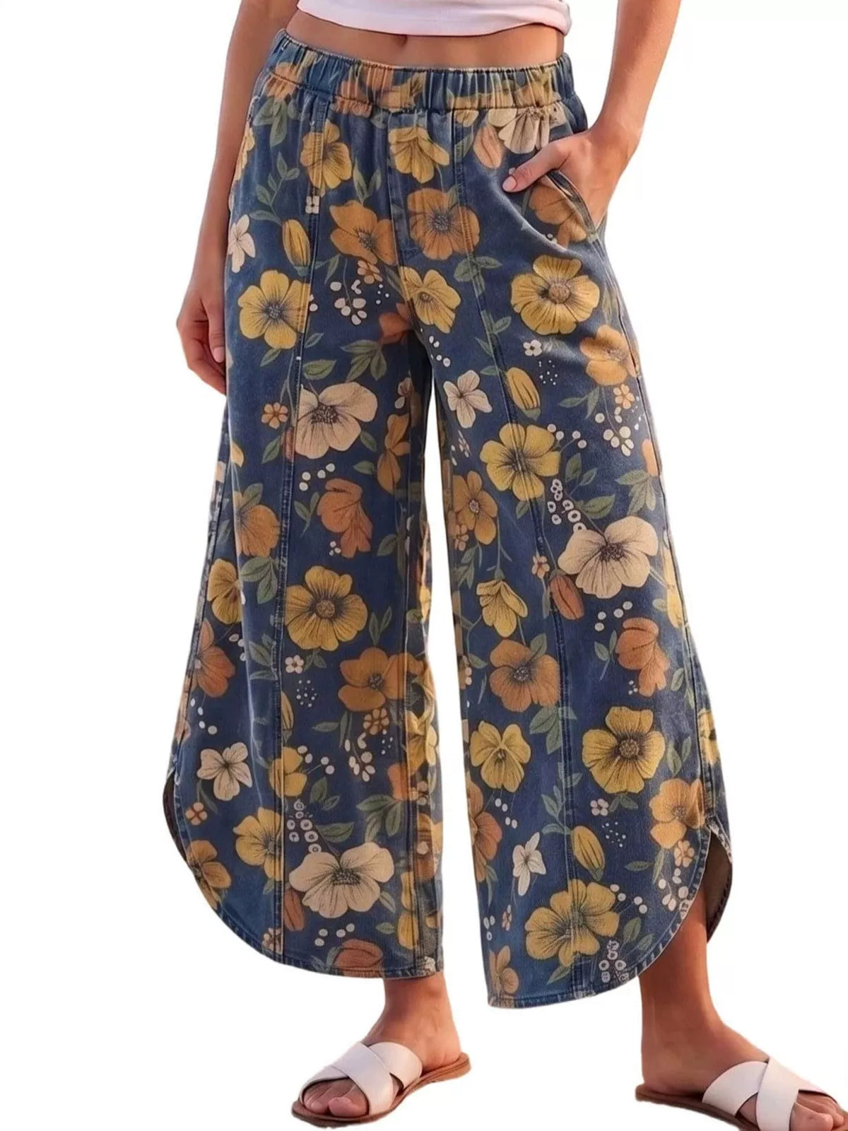 Floral print elastic waist wide-leg jeans from Trendsi with a relaxed fit and vibrant floral pattern.