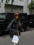 Women's black faux leather bomber jacket