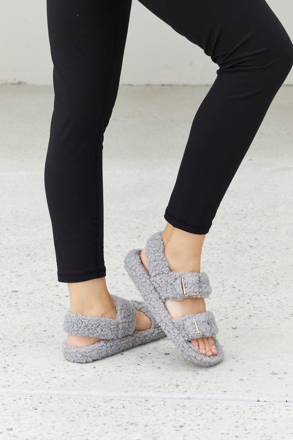 Grey Qupid Cozy Atmosphere faux fur buckled sandals with strap detail, perfect for casual or stylish summer wear.