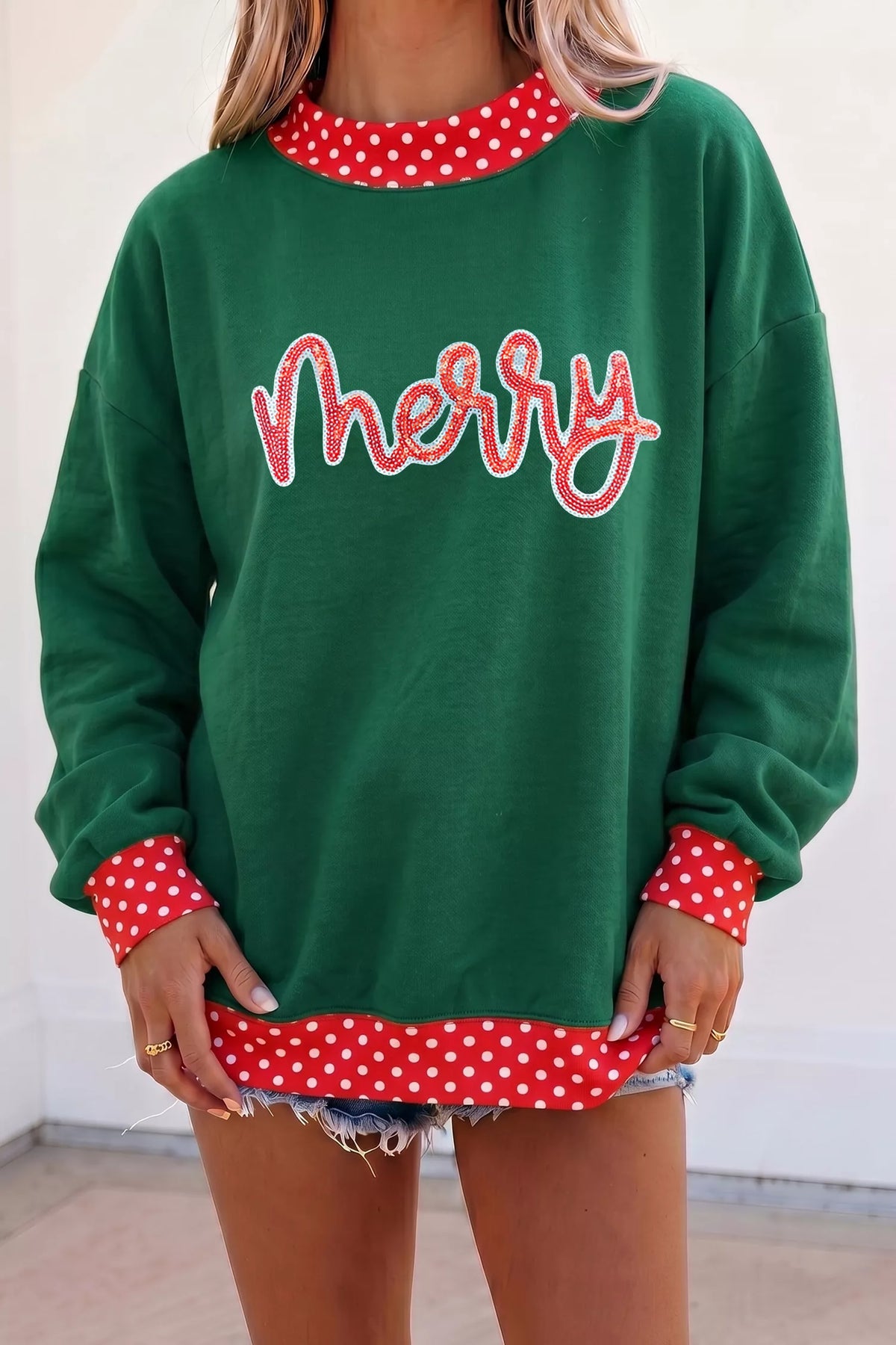Dark green tunic sweatshirt with sequin MERRY slogan