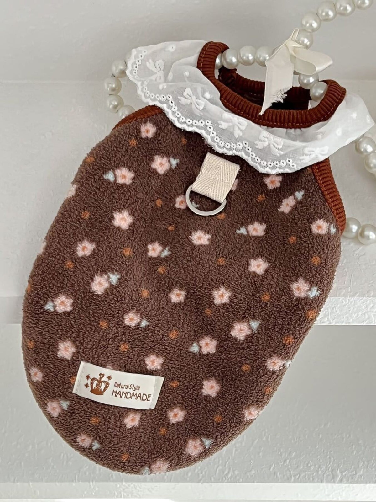 Fleece pet top with lace collar from Trendsi, featuring a cozy fleece fabric and decorative lace detail on the collar.