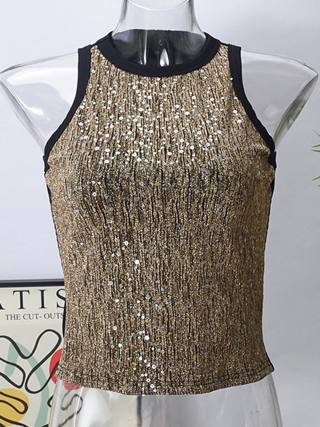 Sequin round neck tank top by Trendsi featuring shimmering sequins and a classic round neckline.