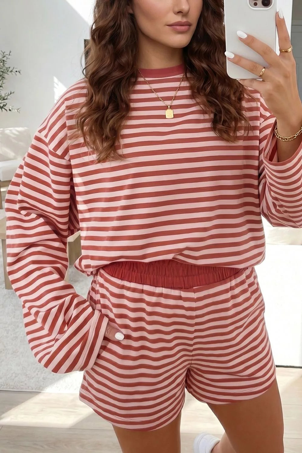 Trendsi Stripe relaxed long sleeve top and contrast elastic waistband shorts set, casual stylish loungewear ensemble.