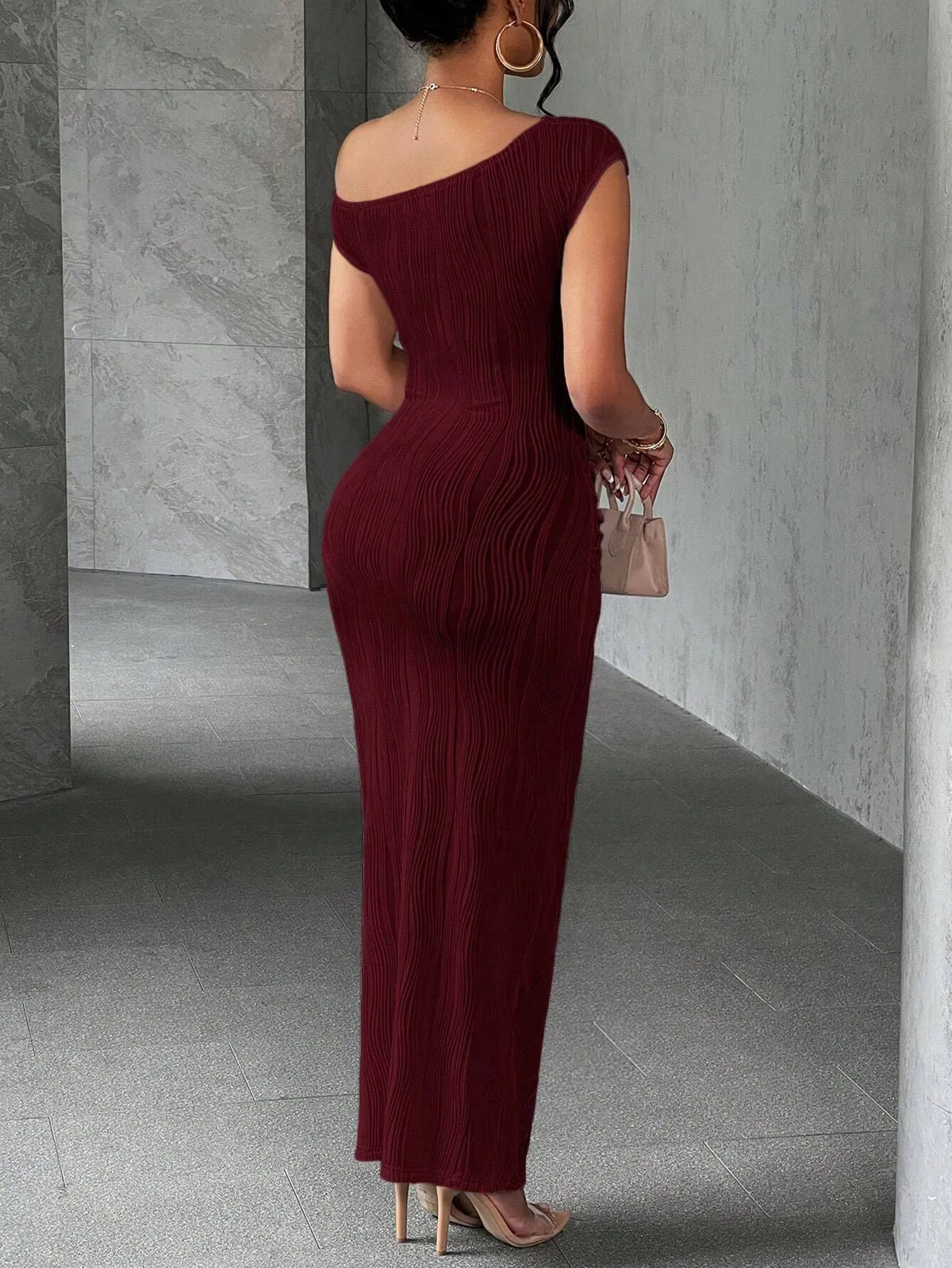 Asymmetrical one shoulder black bodycon maxi dress from Trendsi, featuring a sleek, fitted silhouette and elegant design.