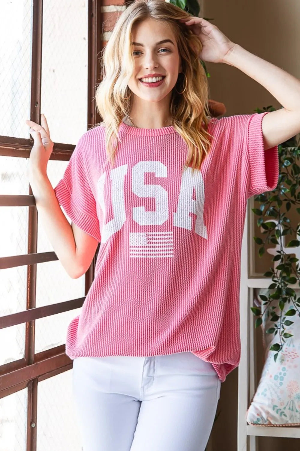 Heimish full size USA graphic short sleeve ribbed top, trendy casual T-shirt with patriotic USA print, worn by a model.