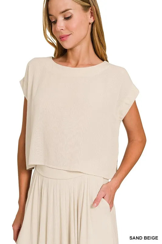Woven crinkle gauze crop tee and skirt set by Trendsi, featuring a stylish, lightweight fabric and coordinated design.
