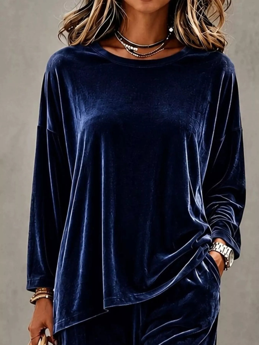 Plus size velvet long sleeve top and pants set by Trendsi, featuring a stylish full-length design and comfortable fit.