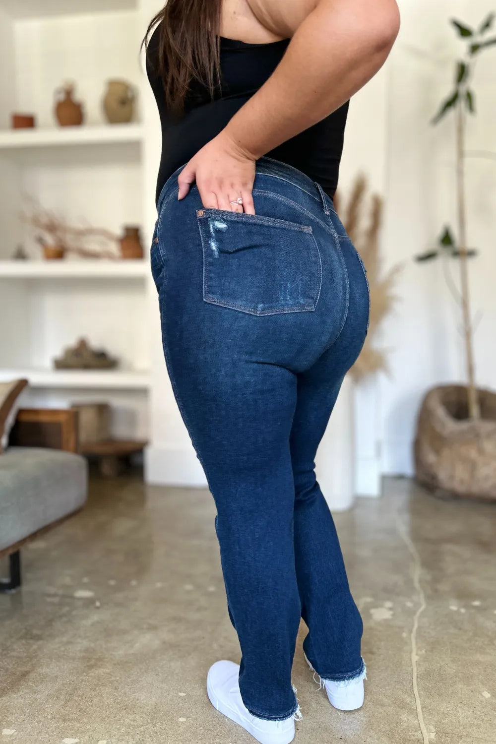 Judy Blue high-waist rigid straight jeans with heavy destroy detailing, showcasing the full size fit and distressed denim style.