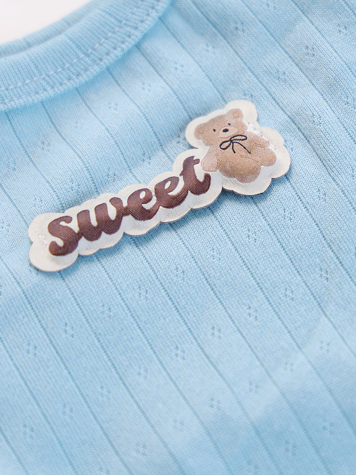 Ribbed pet top featuring a sweet bear patch from Trendsi, designed for small animals or pets, with soft fabric and cute bear detail.