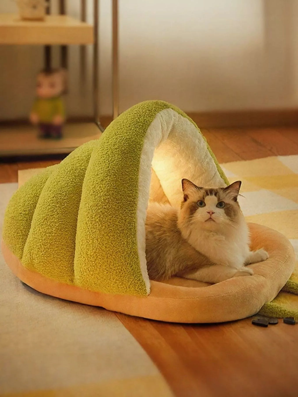 Cozy caterpillar-shaped pet nest with plush interior, soft and comfortable for small pets like cats and small dogs.