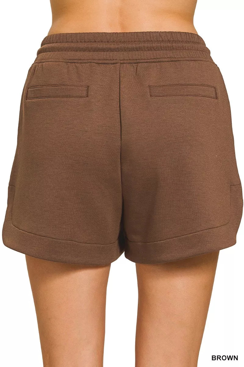 Zenana scuba elastic waistband shorts with pockets, shown in a stylish design, ideal for casual summer wear.