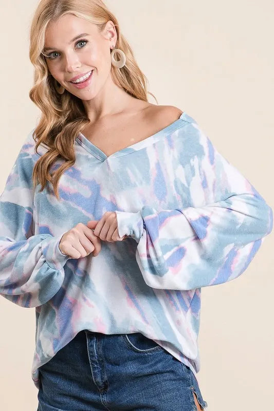 BiBi tie dye French Terry top with balloon sleeves, casual women's fashion featuring vibrant colors and comfortable fabric.