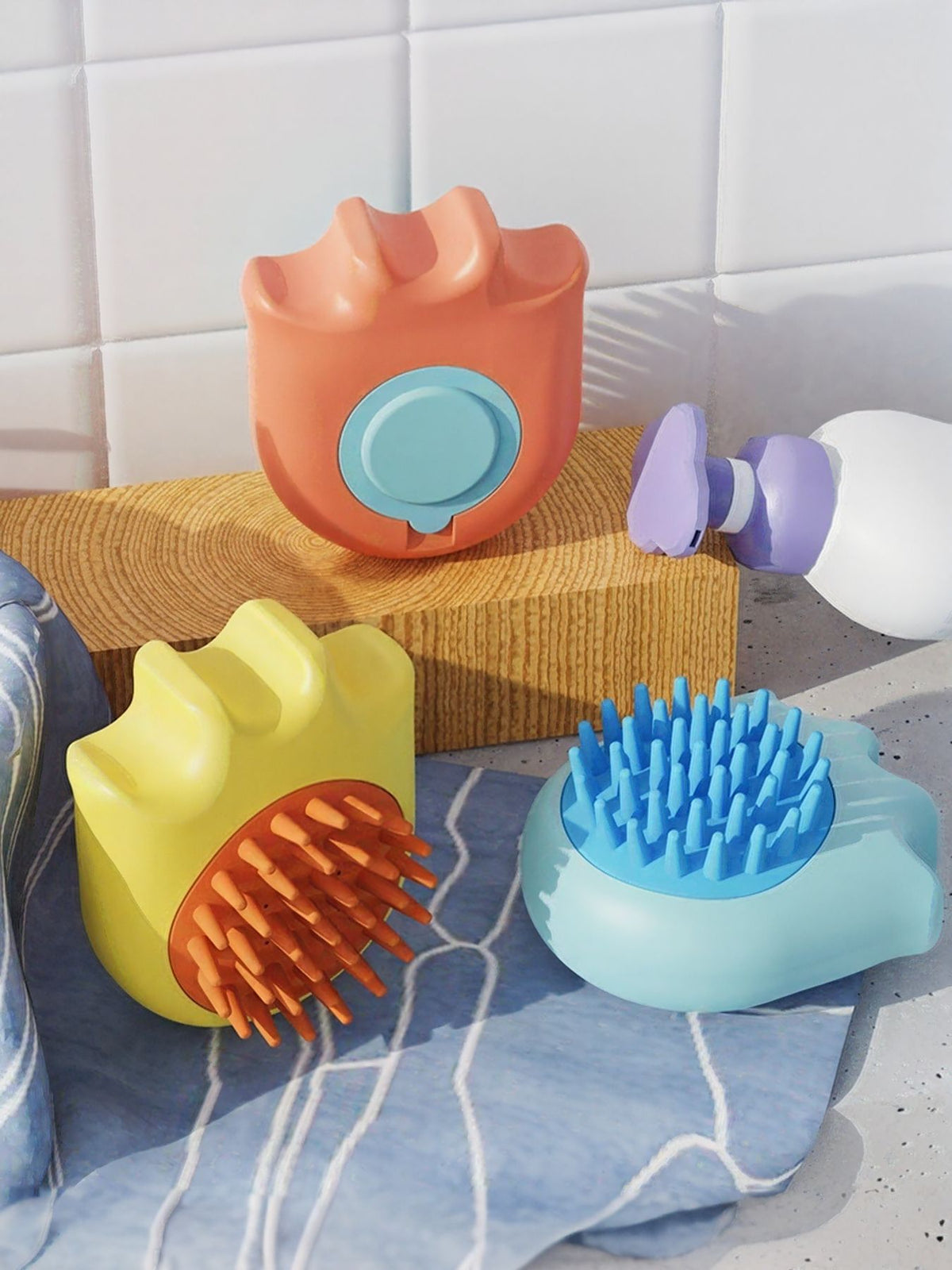 Soft pet shower brush by Trendsi with gentle bristles for bathing cats and dogs, shown in a close-up image.