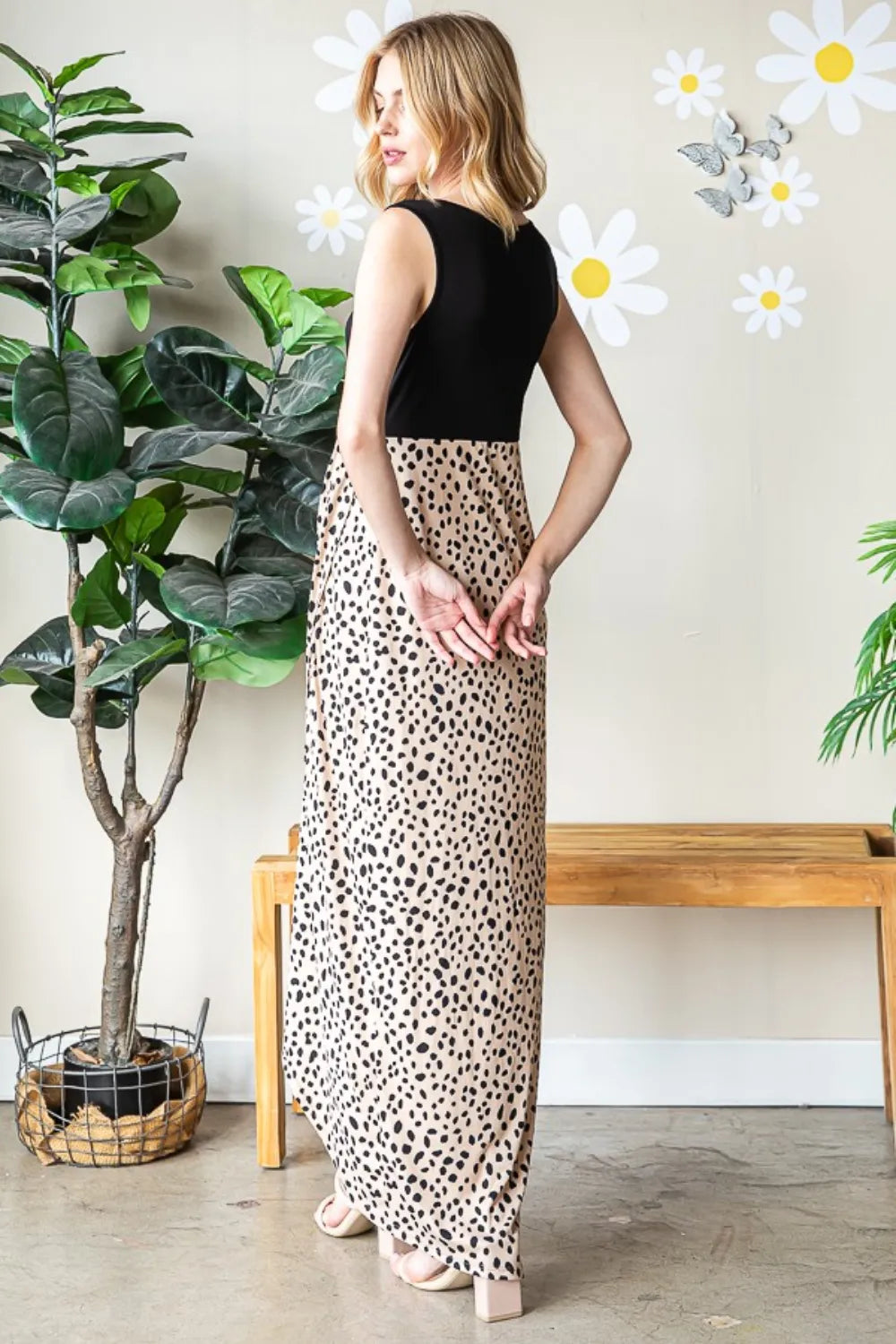 Heimish full size slit animal print V-neck wide strap dress with a stylish design, perfect for fashionable occasions.
