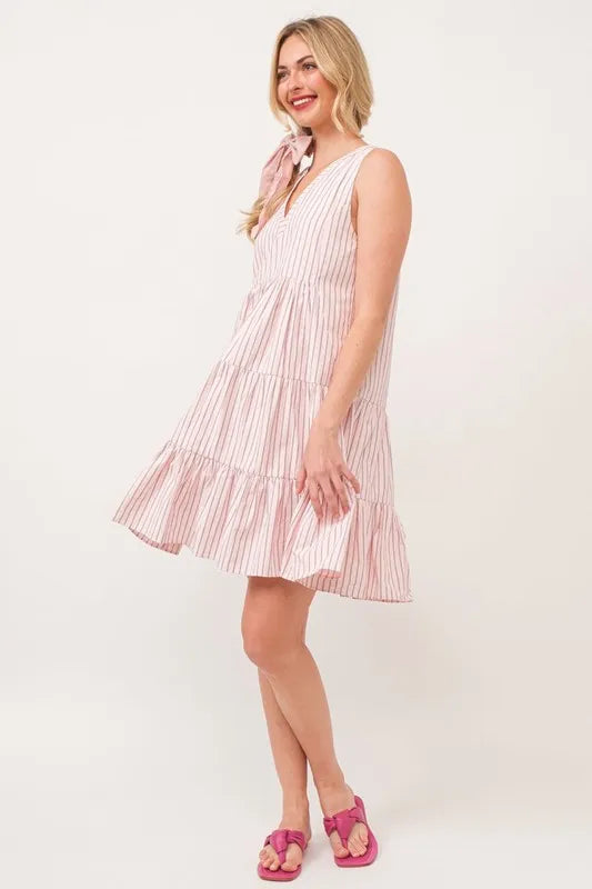 Striped Lime 'N' Chili sleeveless V-neck tiered dress by Trendsi, featuring a vibrant pattern and tiered design.