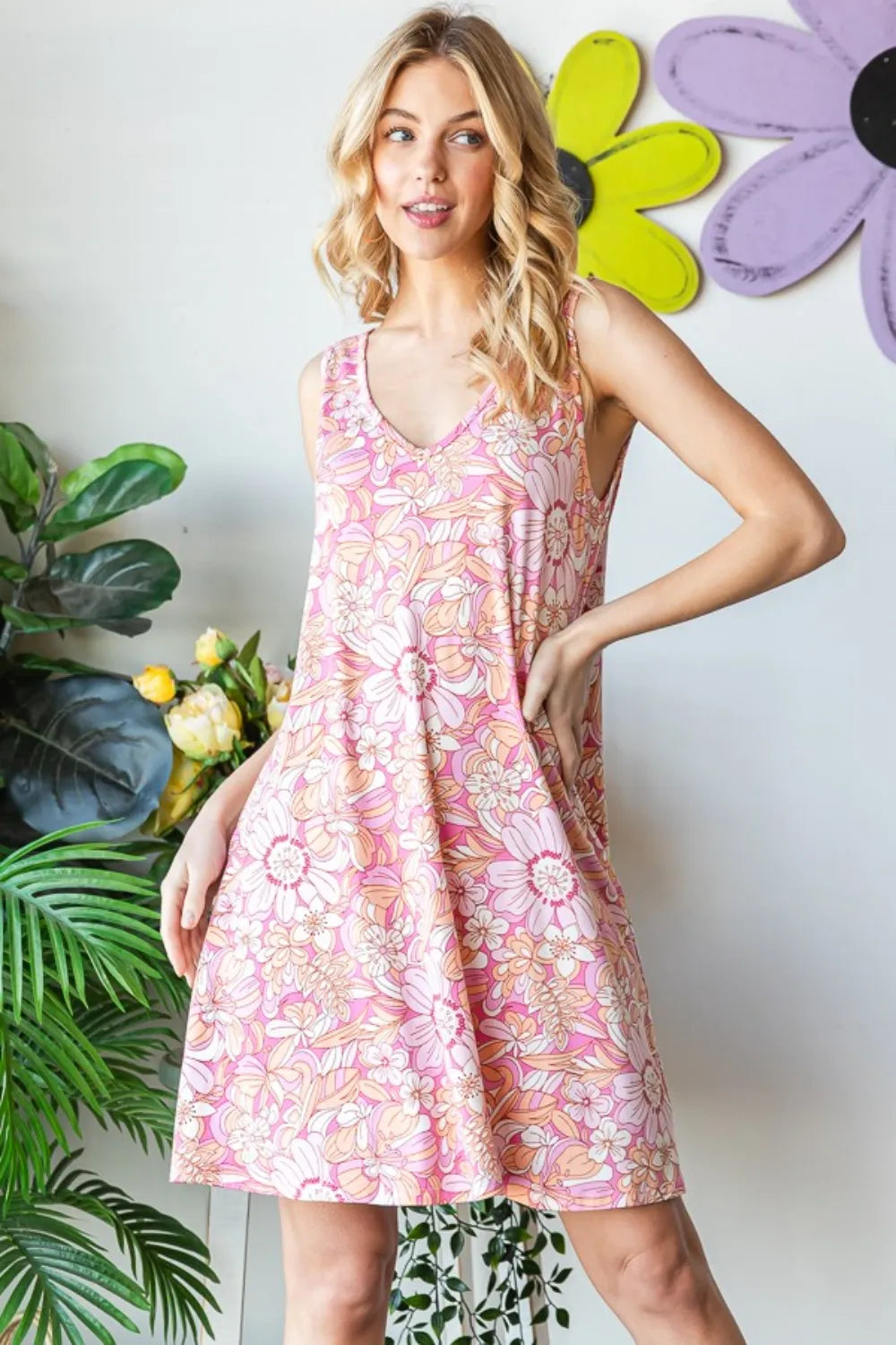 Heimish floral v-neck tank dress with pockets, full size, featuring a colorful floral pattern and sleeveless design.