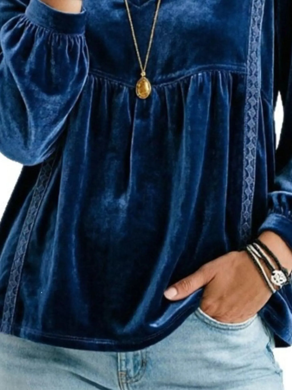 Plus size velvet blouse with a V-neck, long sleeves, and lace trim, featuring a full-size fit from Trendsi.