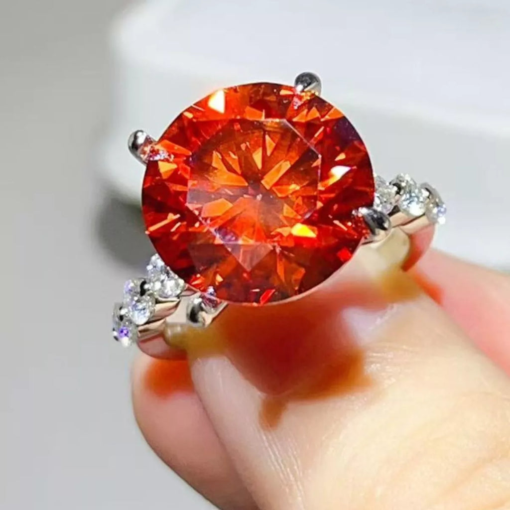 Sterling silver ring with a 10-carat moissanite gemstone, showcasing a sparkling, elegant design.