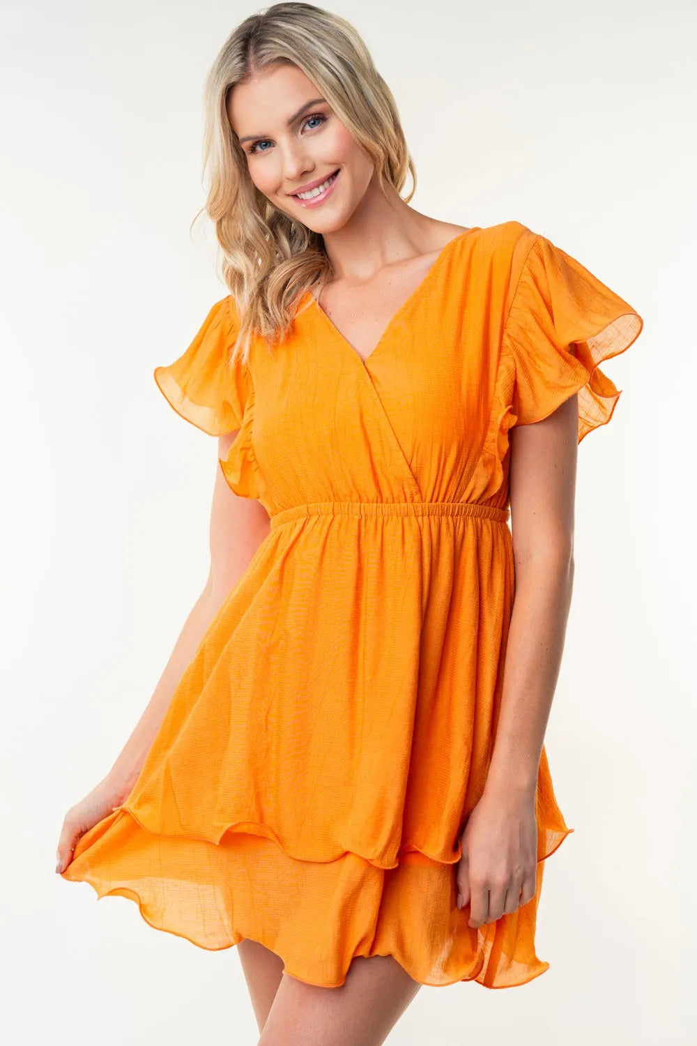 White Birch full size short sleeve woven layered dress by Trendsi, featuring a stylish design with a flowy silhouette and layered fabric.