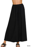 Woven pleated linen blend wide-leg pants by Trendsi, featuring a relaxed fit and stylish design in natural fabric.