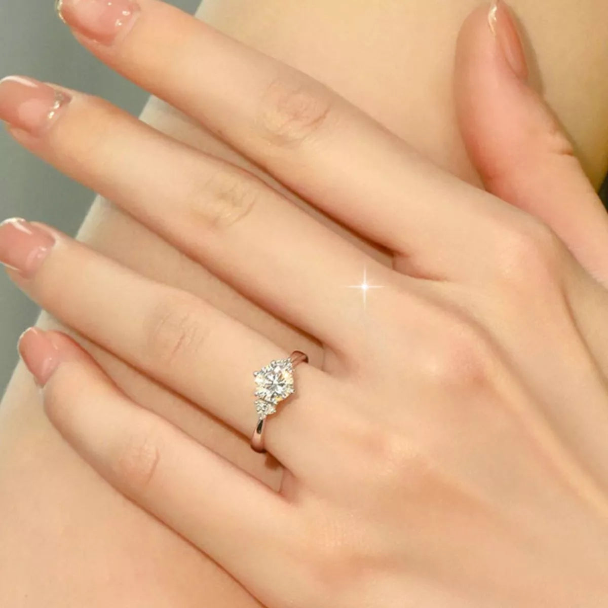 Sterling silver ring with 1 carat moissanite gemstone, featuring a sleek and elegant design.