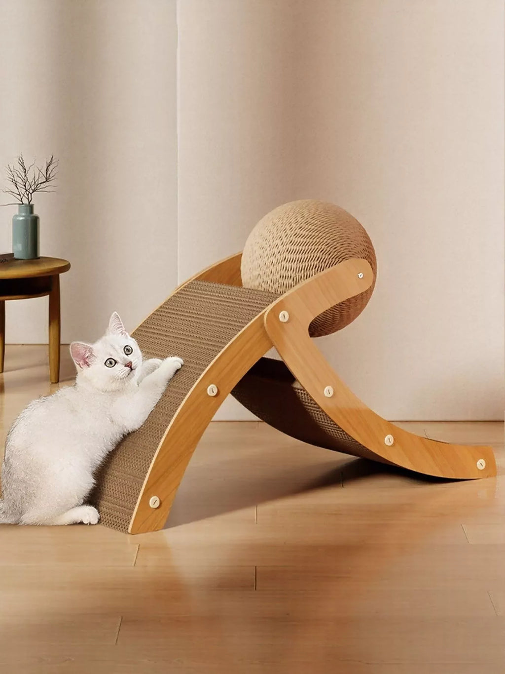Interactive ball and ramp cat scratching post by Trendsi with a colorful ball and sturdy scratching surface for cats.