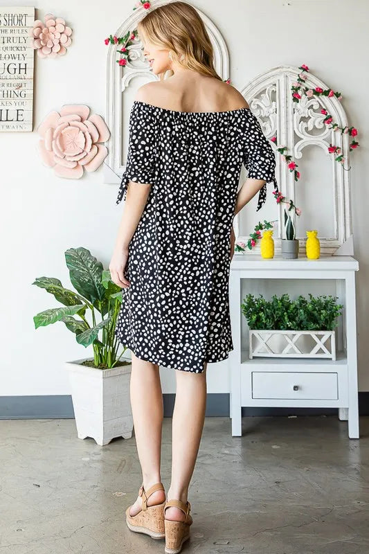 Heimish plus size off-shoulder mini dress with short sleeves, animal print design, soft fabric, trendy style for casual wear.