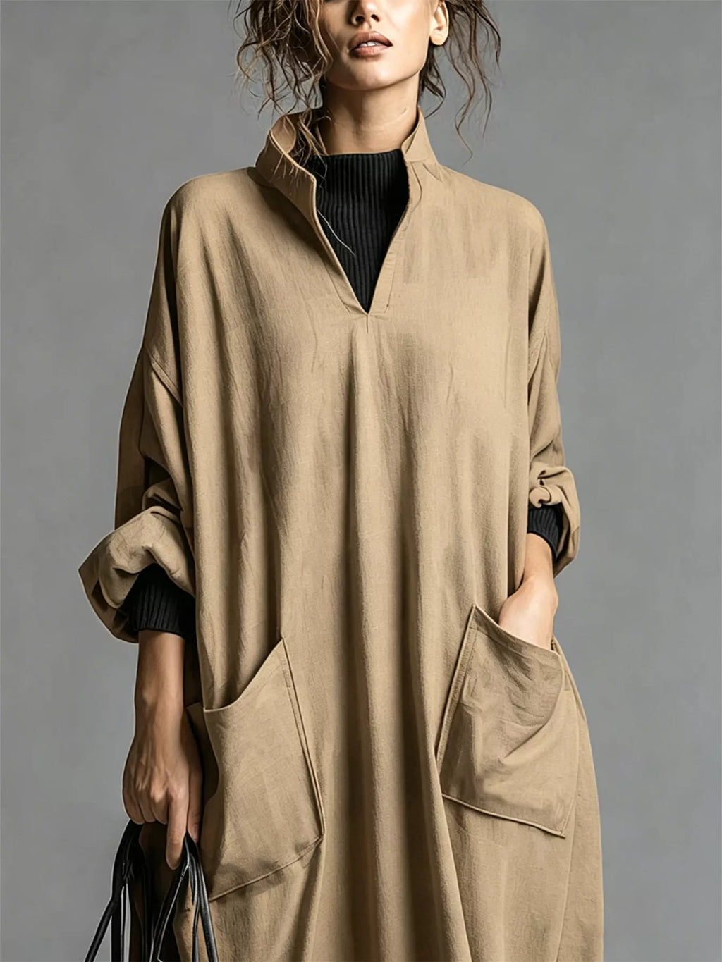 Plus size loose-fit mock neck midi dress with pockets by Trendsi, featuring a full-size, comfortable, casual design.
