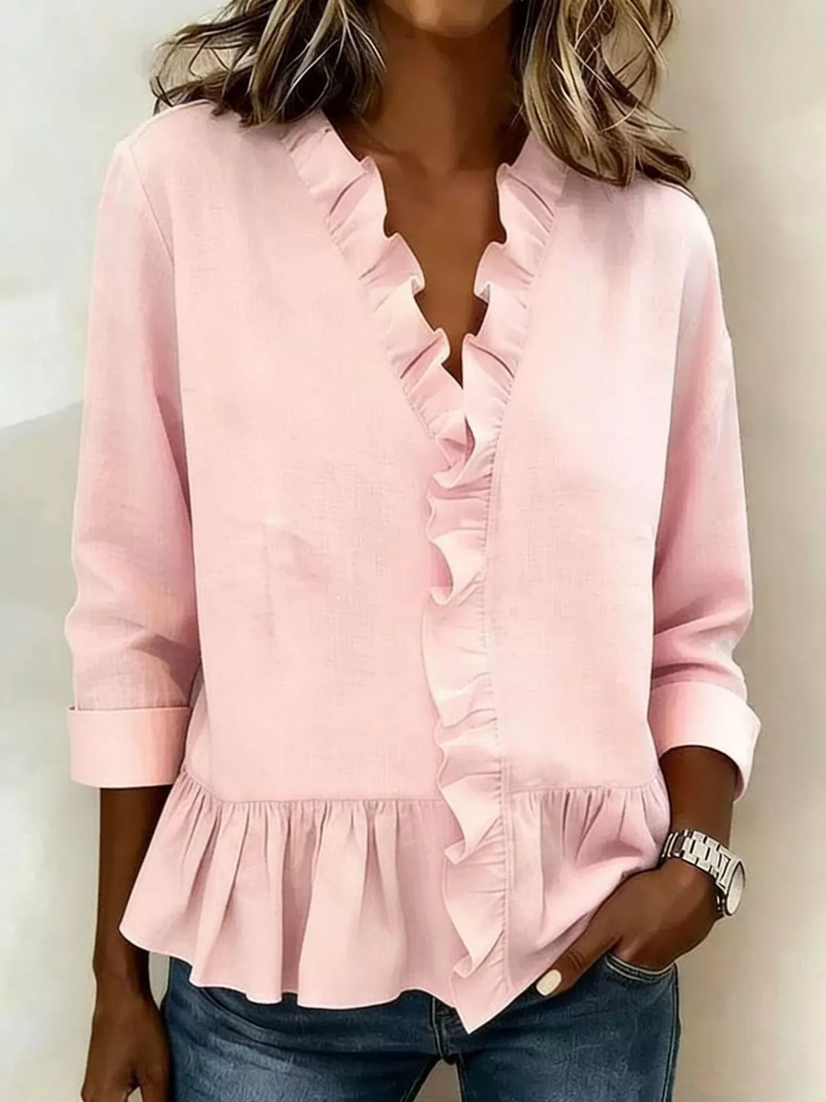 Plus size ruffled v-neck long sleeve blouse by Trendsi featuring a full-length design and stylish ruffle details.