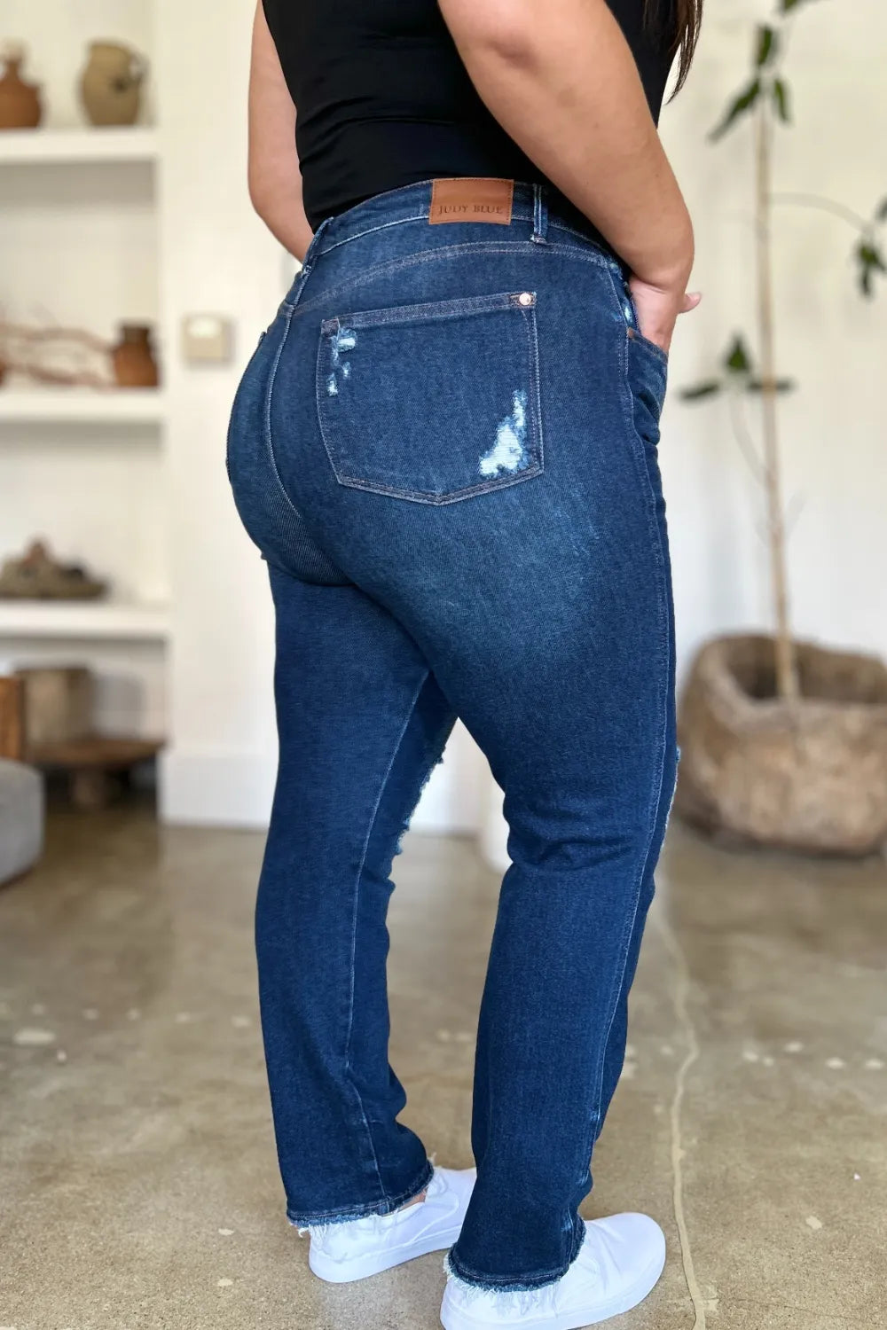Full view of Judy Blue high waist rigid straight jeans featuring heavy destroy detailing and a fitted silhouette.