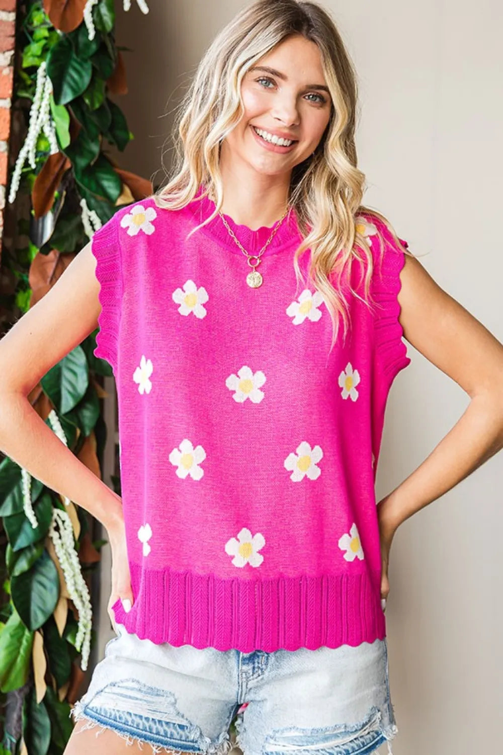 First Love flower pattern round neck sweater vest by Trendsi, featuring a full-size floral print on a cozy knit fabric.
