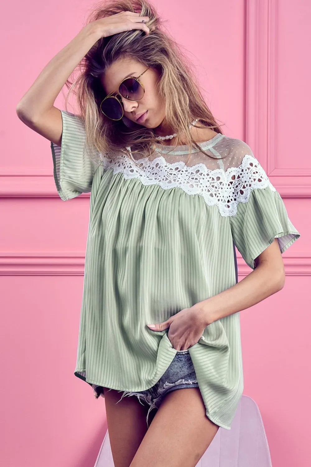 Striped blouse with lace detail and short sleeves from Trendsi, featuring a stylish and comfortable design.
